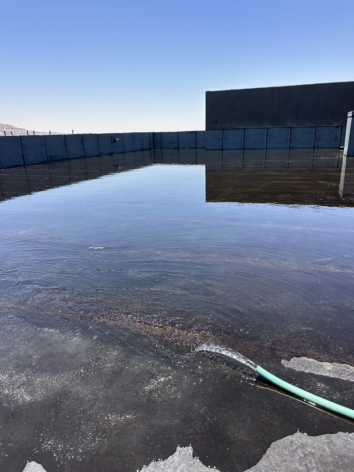 Roof waterproofing flood test
