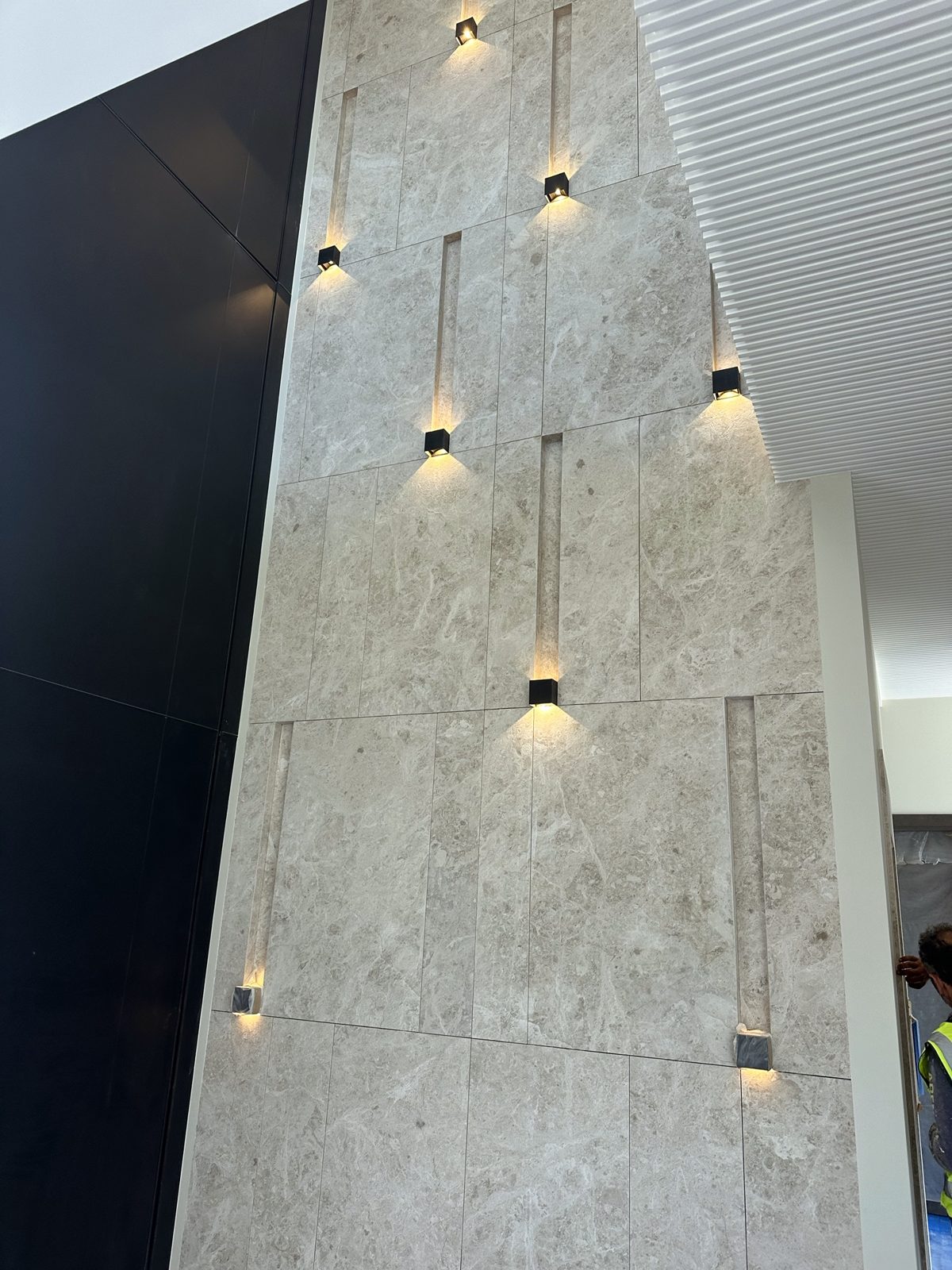 Stone feature wall with wall lights