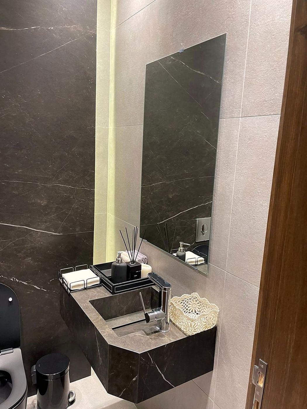 Guest bathroom in dark marble